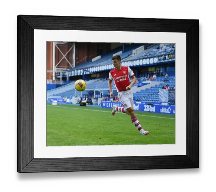Framed Print : Arsenal's Kieran Tierney Clashes with Rangers at Ibrox Stadium