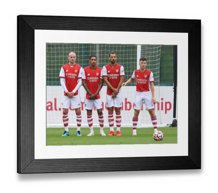 Framed Print : Arsenal's Star Players Form a Wall in Pre-Season Friendly Against Millwall Framed Print : Arsenal's Star Players Form a Wall in Pre-Season Friendly Against Millwall