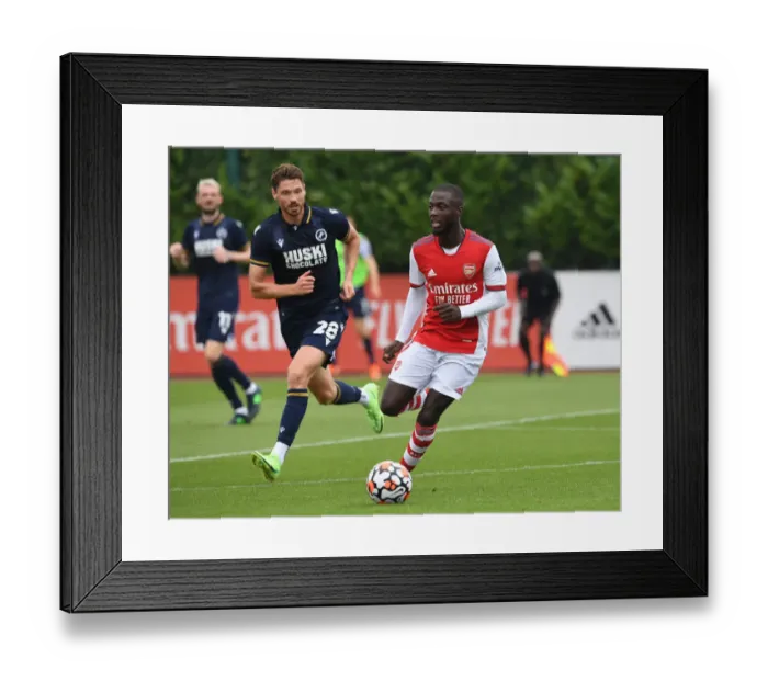 Framed Print : Arsenal's Nicolas Pepe in Action: Arsenal vs Millwall (2021-22 Pre-Season)