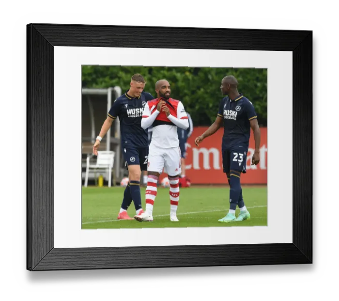 Framed Print : Arsenal's Lacazette Engages with Millwall's Afobe and Ballard during Pre-Season Friendly Framed Print : Arsenal's Lacazette Engages with Millwall's Afobe and Ballard during Pre-Season Friendly