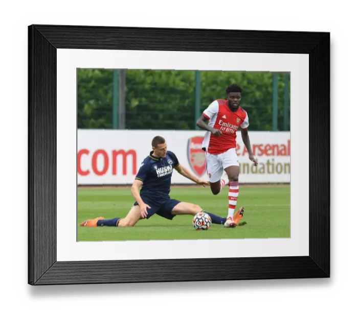 Framed Print : Arsenal's Thomas Partey: Training with Millwall During Arsenal's 2021 Pre-Season Framed Print : Arsenal's Thomas Partey: Training with Millwall During Arsenal's 2021 Pre-Season