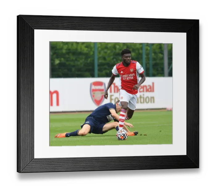 Framed Print : Thomas Partey in Action: Arsenal's Pre-Season Battle against Millwall