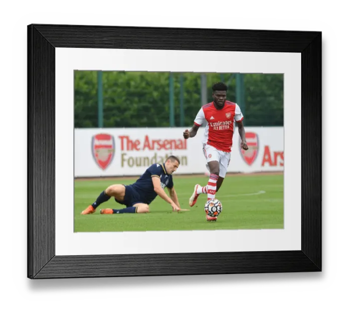 Framed Print : Thomas Partey in Action: Arsenal's Pre-Season Battle against Millwall