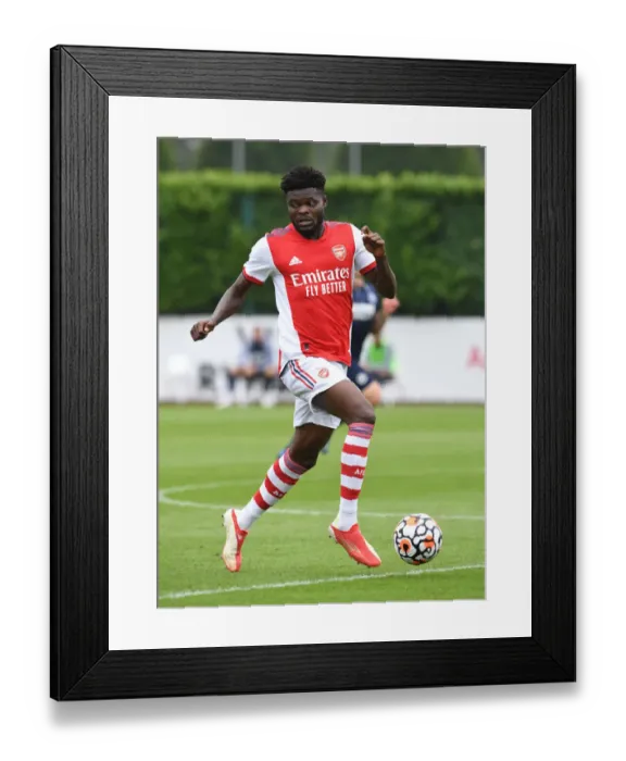 Framed Print : Thomas Partey in Action: Arsenal's Pre-Season Battle against Millwall Framed Print : Thomas Partey in Action: Arsenal's Pre-Season Battle against Millwall