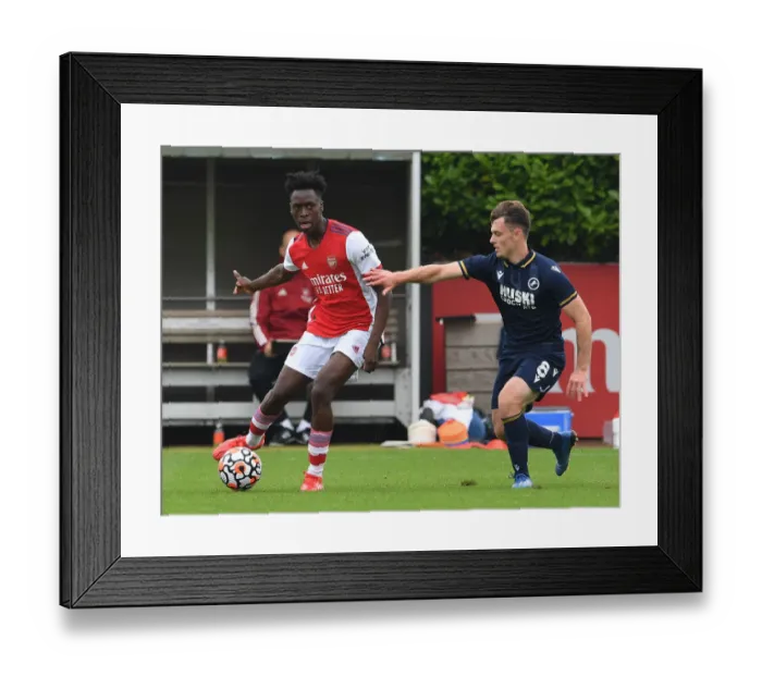 Framed Print : Arsenal's Albert Sambi Lokonga Shines in Pre-Season Match Against Millwall Framed Print : Arsenal's Albert Sambi Lokonga Shines in Pre-Season Match Against Millwall