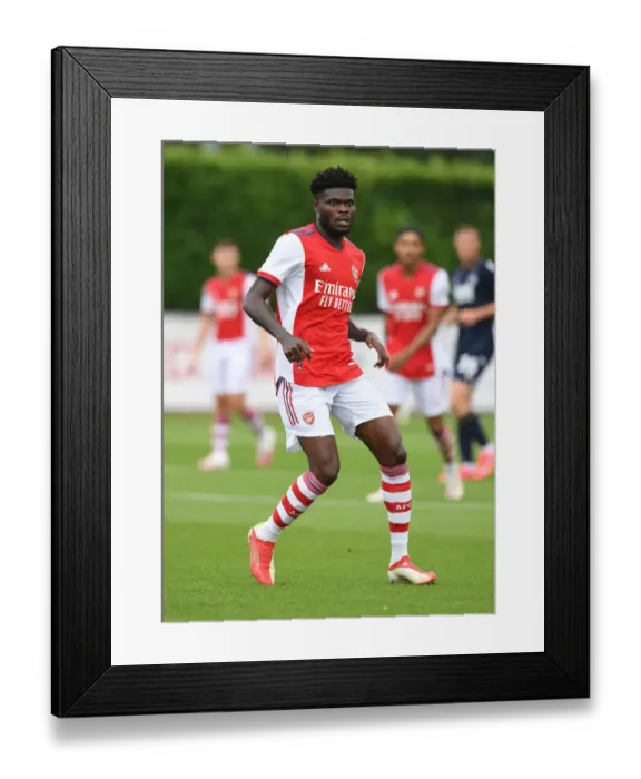 Framed Print : Thomas Partey in Action: Arsenal's Pre-Season Battle against Millwall Framed Print : Thomas Partey in Action: Arsenal's Pre-Season Battle against Millwall