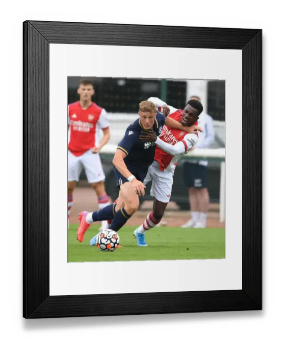 Framed Print : Arsenal vs Millwall: Eddie Nketiah and Daniel Ballard Clash in Pre-Season Friendly