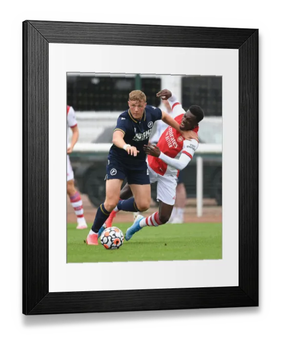 Framed Print : Nketiah vs Ballard: A Clash in Arsenal's Pre-Season Friendly Against Millwall