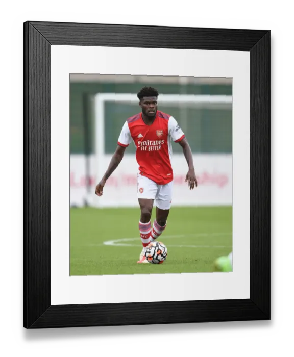 Framed Print : Thomas Partey in Action: Arsenal's Pre-Season Training vs Millwall (2021-22) Framed Print : Thomas Partey in Action: Arsenal's Pre-Season Training vs Millwall (2021-22)