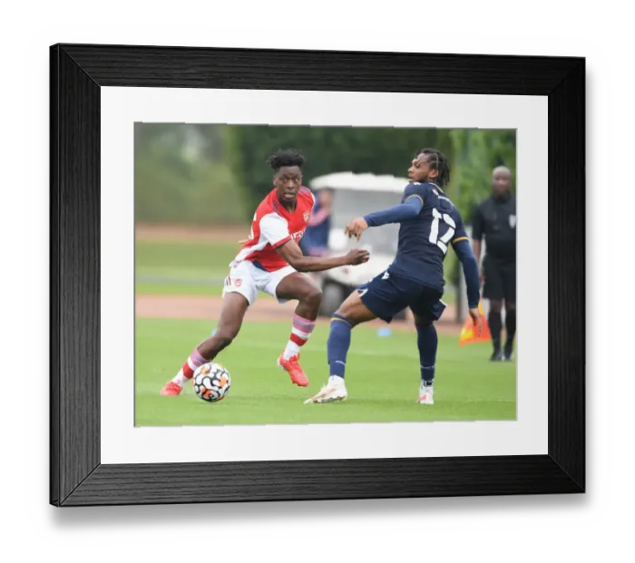 Framed Print : Arsenal's Sambi Outmaneuvers Millwall's Romeo in Pre-Season Friendly