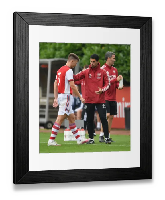 Framed Print : Arsenal Manager Mikel Arteta Speaks with Kieran Tierney after Substitution during Arsenal vs Millwall Pre-Season Friendly