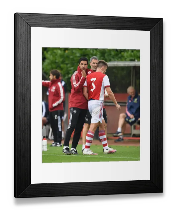 Framed Print : Mikel Arteta Comforts Substituted Kieran Tierney: Arsenal's Support Behind Closed Doors (Arsenal vs Millwall 2021-22)