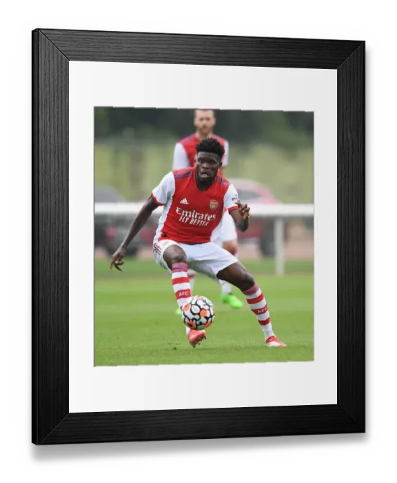 Framed Print : Arsenal's Thomas Partey Trains with Millwall: Pre-Season Friendly (2021) Framed Print : Arsenal's Thomas Partey Trains with Millwall: Pre-Season Friendly (2021)