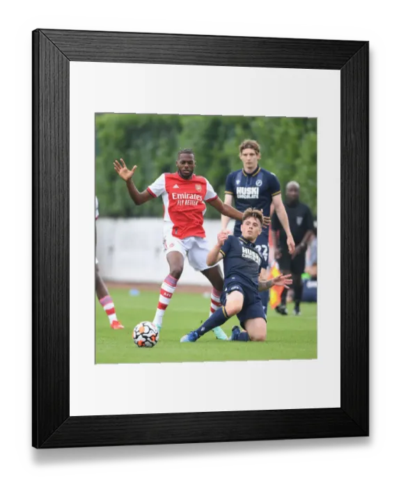 Framed Print : Arsenal's Nuno Tavares in Pre-Season Action Against Millwall Framed Print : Arsenal's Nuno Tavares in Pre-Season Action Against Millwall