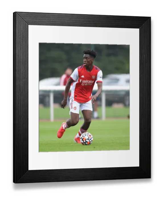 Framed Print : Arsenal's Sambi Shines in Pre-Season Match Against Millwall