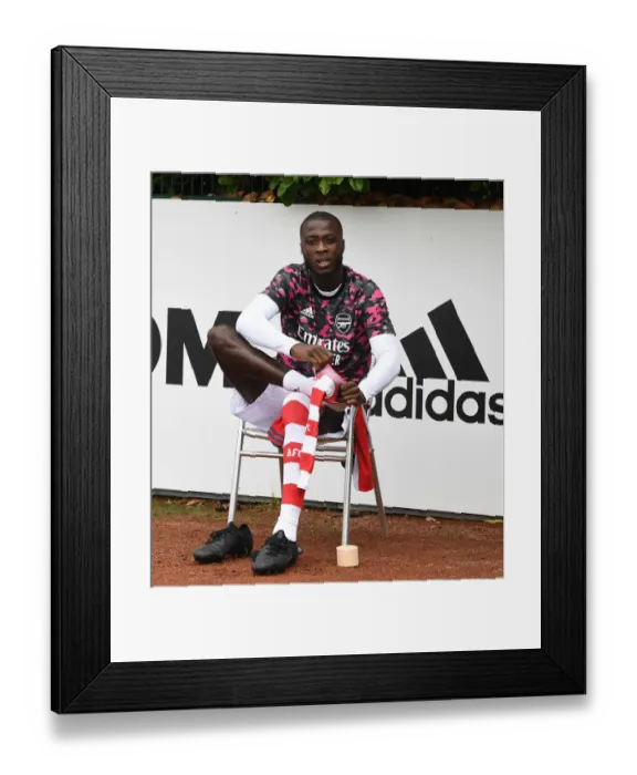 Framed Print : Arsenal's Nicolas Pepe Prepares for Arsenal v Millwall Pre-Season Friendly