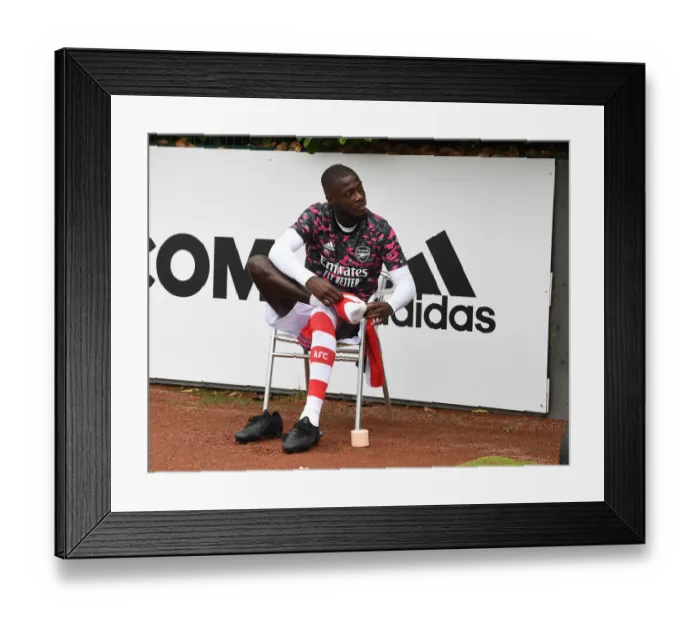 Framed Print : Arsenal's Nicolas Pepe Gears Up for Arsenal v Millwall Pre-Season Friendly Framed Print : Arsenal's Nicolas Pepe Gears Up for Arsenal v Millwall Pre-Season Friendly