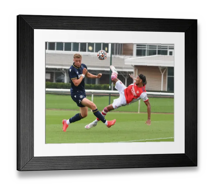 Framed Print : Arsenal's Aubameyang Faces Off Against Millwall's Ballard in 2021-22 Pre-Season Friendly