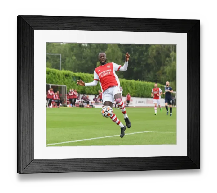 Framed Print : Arsenal's Nicolas Pepe Shines in Pre-Season: Arsenal vs Millwall (2021-22)