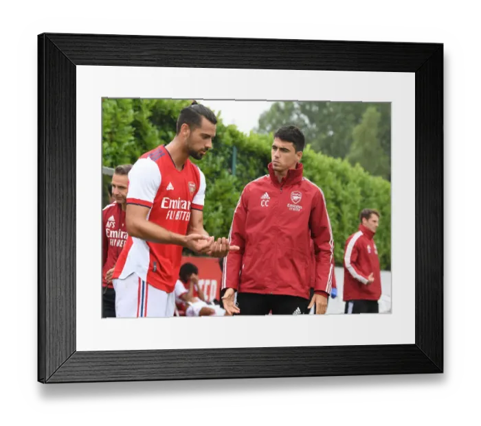 Framed Print : Arsenal Half-Time: Carlo Cuesta Speaks with Pablo Mari during Arsenal vs. Millwall Pre-Season Friendly