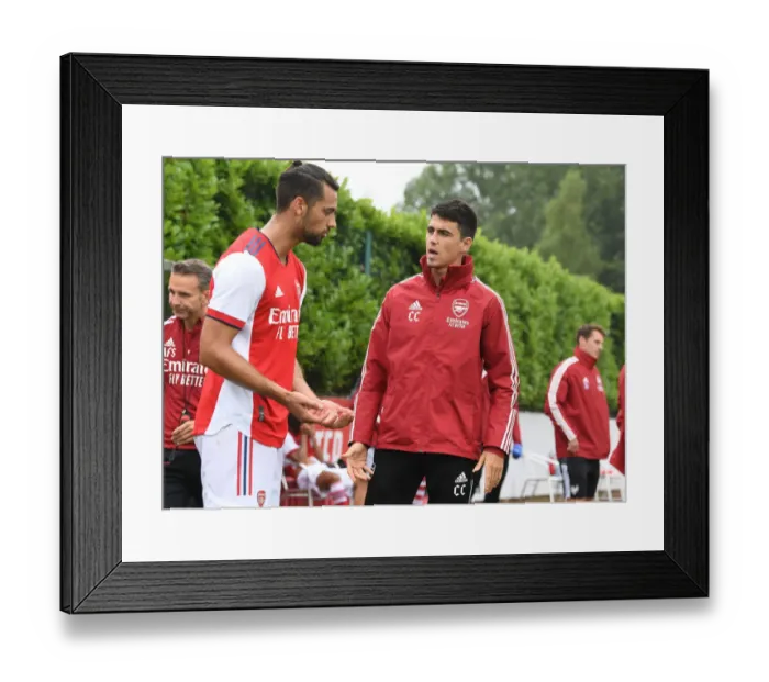 Framed Print : Arsenal Half-Time: Carlo Cuesta Strategizes with Pablo Mari