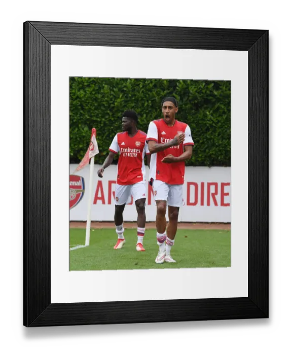 Framed Print : Arsenal's Thomas Partey and Pierre-Emerick Aubameyang Post-Match: Arsenal v Millwall, 2021-22 Pre-Season Friendly