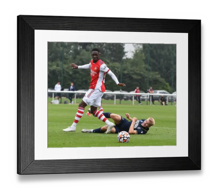 Framed Print : Arsenal's Flo Balogun Shines in Pre-Season Friendly Against Millwall