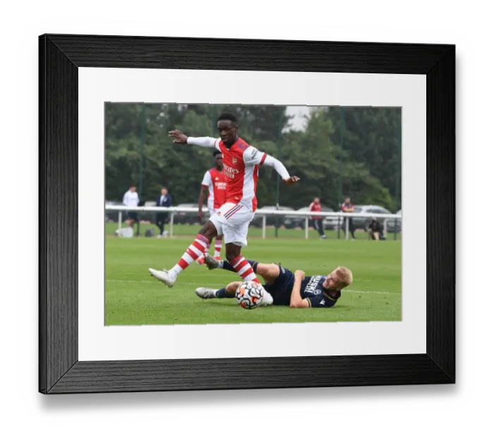 Framed Print : Arsenal's Flo Balogun Shines in Pre-Season Victory over Millwall