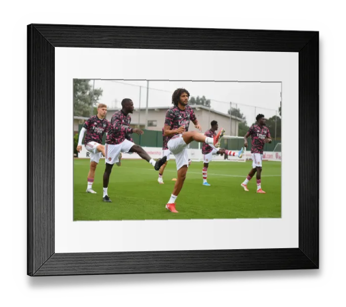 Framed Print : Arsenal's Mo Elneny Prepares for Arsenal v Millwall Pre-Season Friendly
