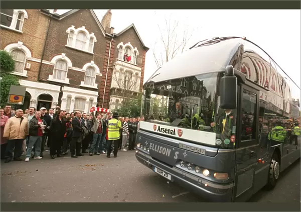 The Arsenal Team Coach arrives outside the East Stand on Avenell Road
