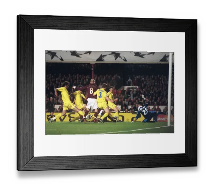 Framed Print : Kolo Toure slides in to score Arsenals 1st goal. Arsenal 1: 0 Villarreal Framed Print : Kolo Toure slides in to score Arsenals 1st goal. Arsenal 1: 0 Villarreal