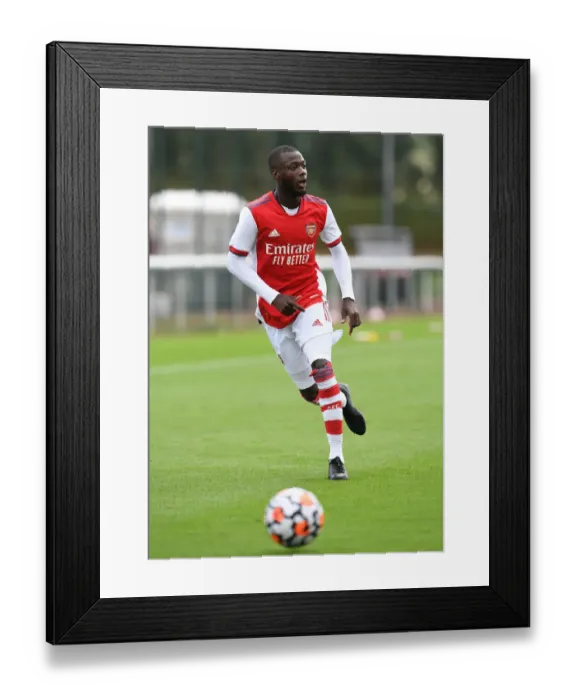 Framed Print : Arsenal's Nicolas Pepe Shines in Pre-Season Friendly Against Watford
