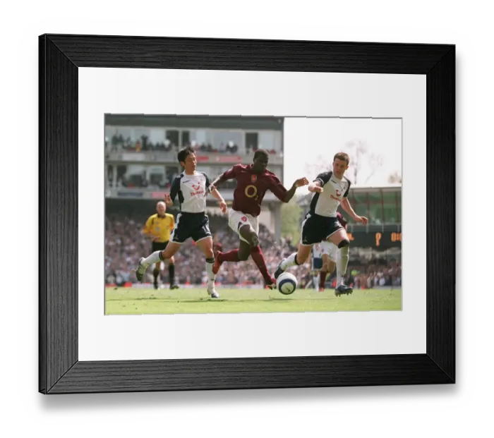 Framed Print : Emmanuel Eboue (Arsenal) Young-Pyo Lee and Michael Carrick (Tottenham) Framed Print : Emmanuel Eboue (Arsenal) Young-Pyo Lee and Michael Carrick (Tottenham)