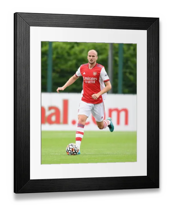 Framed Print : Arsenal's Rob Holding in Action: Arsenal vs. Watford Pre-Season Clash, 2021-22