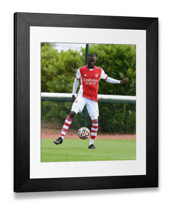 Framed Print : Arsenal's Nicolas Pepe in Action: Arsenal vs. Watford Pre-Season Clash, 2021-22