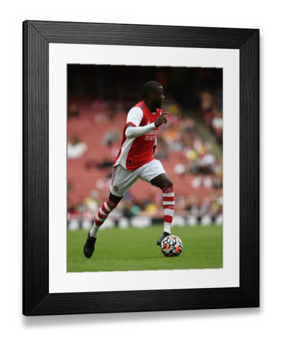 Framed Print : Arsenal's Pepe Shines: A Battle of Spirits - Arsenal vs Chelsea Pre-Season Clash at Emirates Stadium