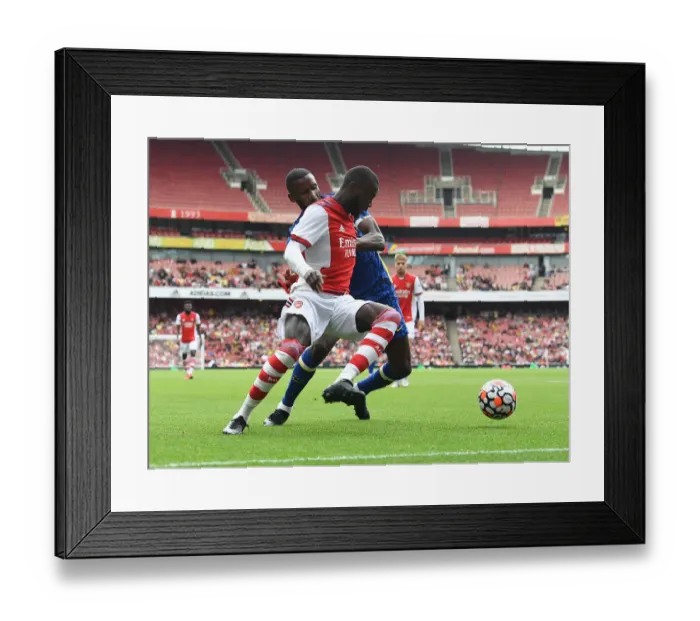 Framed Print : Clash of Talents: Pepe vs. Loftus-Cheek - Arsenal vs. Chelsea Pre-Season Showdown