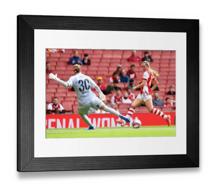 Framed Print : Arsenal vs Chelsea: Women's Football - Tense Moment as Evans Shoots Past Berger Framed Print : Arsenal vs Chelsea: Women's Football - Tense Moment as Evans Shoots Past Berger