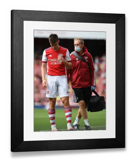 Framed Print : Arsenal's Kieran Tierney Receives Treatment: Arsenal v Chelsea Pre-Season Clash Framed Print : Arsenal's Kieran Tierney Receives Treatment: Arsenal v Chelsea Pre-Season Clash