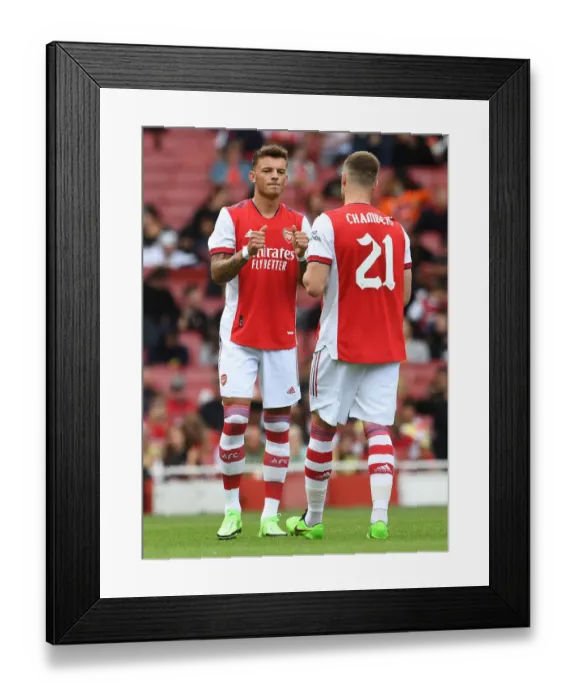 Framed Print : Arsenal vs Chelsea: Clash of Minds - White and Chambers in Action Framed Print : Arsenal vs Chelsea: Clash of Minds - White and Chambers in Action