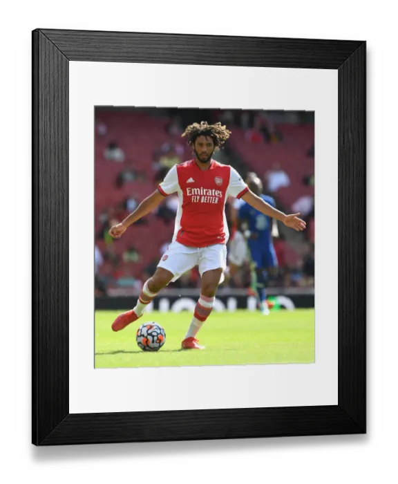 Framed Print : Arsenal vs. Chelsea: Elneny's Focused Performance in Pre-Season Clash at Emirates Stadium