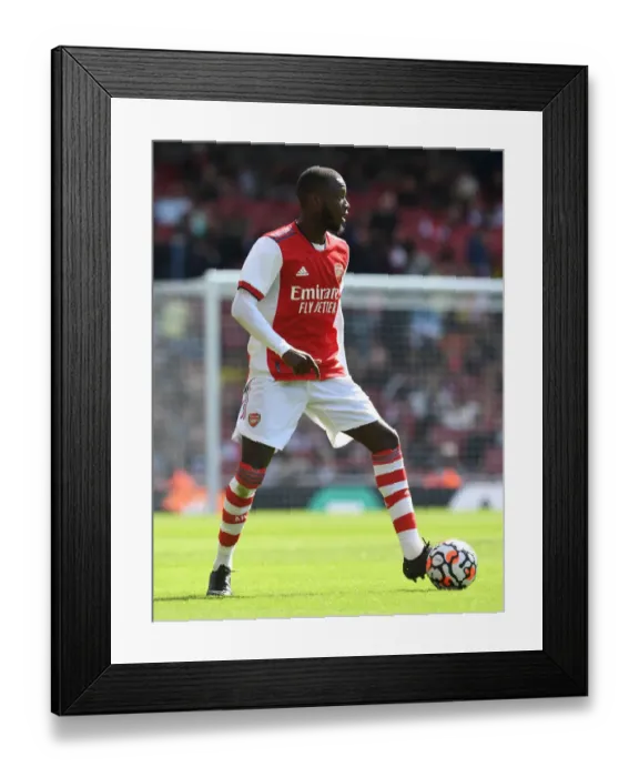 Framed Print : Arsenal vs Chelsea: Pepe's Pre-Season Showdown at Emirates Stadium, London (2021)