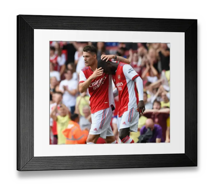 Framed Print : Arsenal's Xhaka and Pepe Celebrate Goal: Arsenal vs. Chelsea Pre-Season Clash, 2021-22