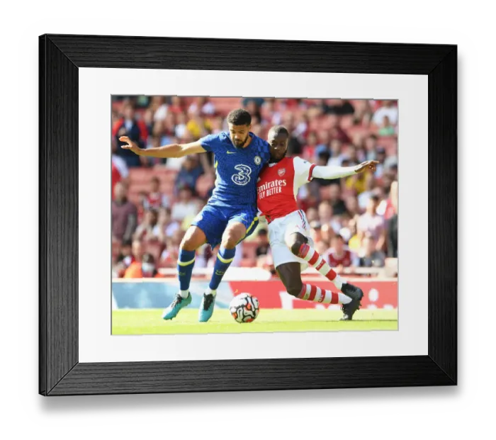 Framed Print : Arsenal vs Chelsea: Pepe vs Clarke-Salter - A Clash of Talents at the Emirates Framed Print : Arsenal vs Chelsea: Pepe vs Clarke-Salter - A Clash of Talents at the Emirates