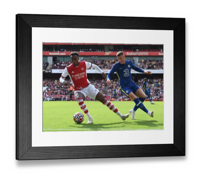 Framed Print : Clash of Minds: Arsenal vs. Chelsea - The Battle for Supremacy at the Emirates