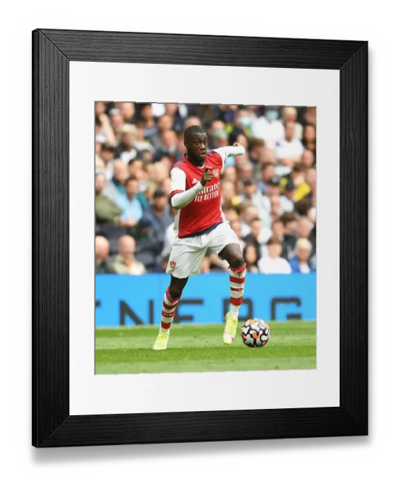 Framed Print : London Derby Showdown: Nicolas Pepe vs. Tottenham - Arsenal's Star Forward Faces Off in the North London Rivalry Framed Print : London Derby Showdown: Nicolas Pepe vs. Tottenham - Arsenal's Star Forward Faces Off in the North London Rivalry