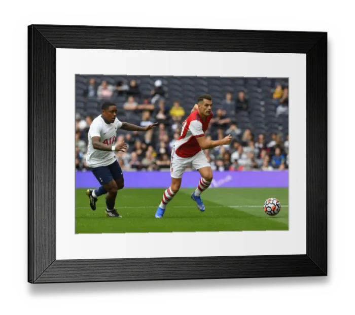 Framed Print : Clash of Minds: Xhaka vs Bergwijn - Tottenham vs Arsenal Football Rivalry Framed Print : Clash of Minds: Xhaka vs Bergwijn - Tottenham vs Arsenal Football Rivalry