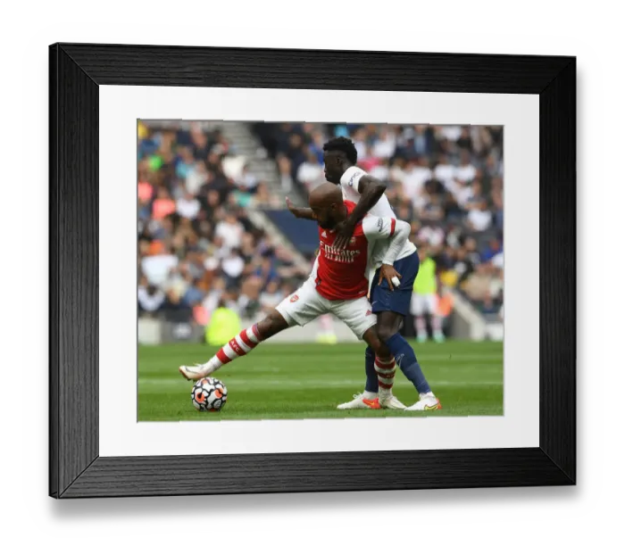Framed Print : Clash of the Capital Rivals: Lacazette vs. Sanchez - Tottenham vs. Arsenal, 2021-22