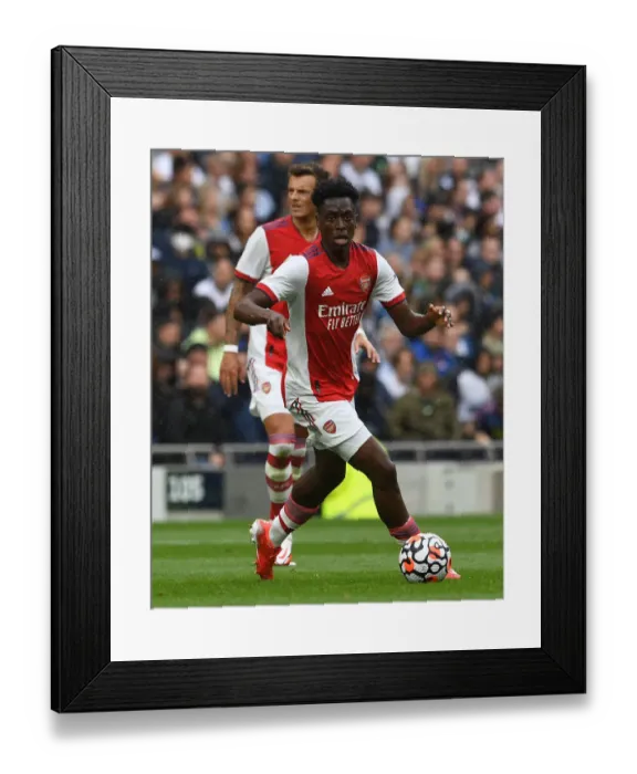 Framed Print : Albert Sambi Lokonga's Unwavering Concentration: Arsenal vs. Tottenham's Intense Rivalry, Premier League Showdown Framed Print : Albert Sambi Lokonga's Unwavering Concentration: Arsenal vs. Tottenham's Intense Rivalry, Premier League Showdown