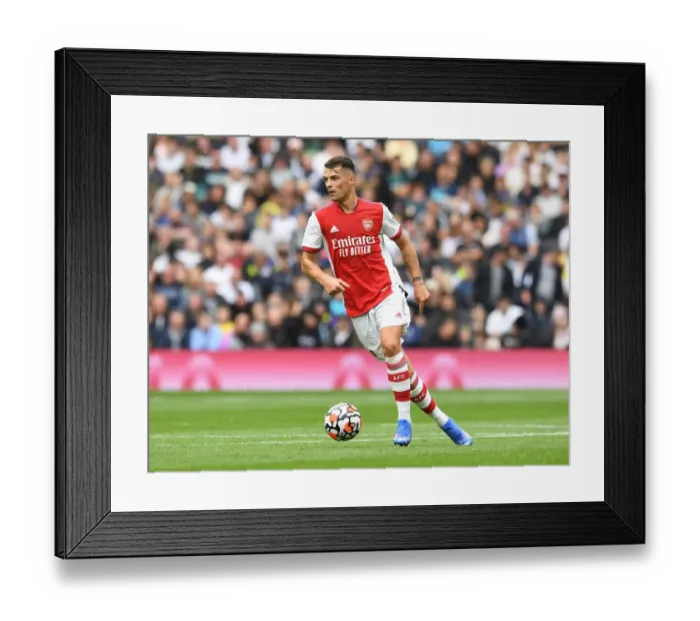 Framed Print : Granit Xhaka in Action: Tottenham Hotspur vs. Arsenal - The MIND Series 2021-22